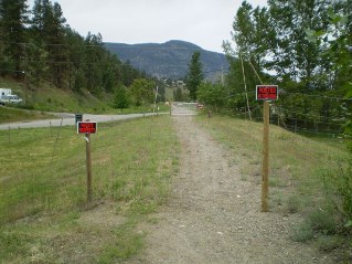 Original trail fenced off north of Kaleden, Kettle Valley Railway Okanagan Falls to Penticton, 2014-05.